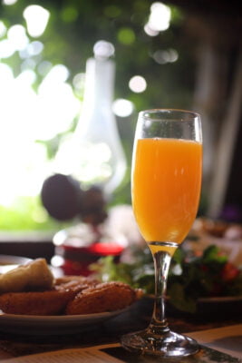 Seaberry Mimosa on a table set for Sunday Brunch
